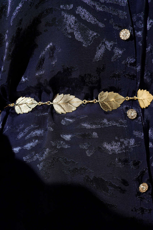 Ceinture chaîne dorée avec pendentif feuille