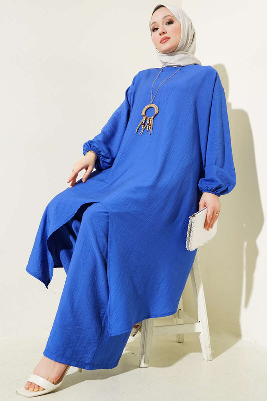 بدلة مكونة من قطعتين بأكمام خفاش وقصّة غير متماثلة من ساكسفون