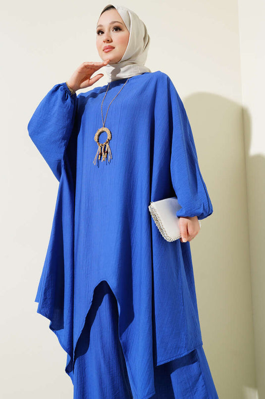 بدلة مكونة من قطعتين بأكمام خفاش وقصّة غير متماثلة من ساكسفون