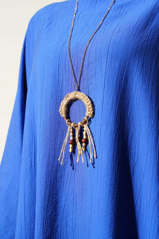 بدلة مكونة من قطعتين بأكمام خفاش وقصّة غير متماثلة من ساكسفون