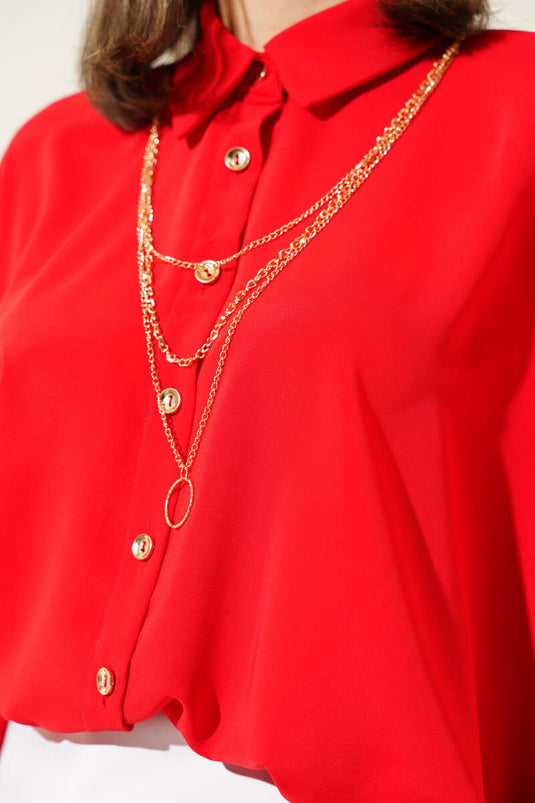 Chemise oversize rouge avec collier chauve-souris sur les manches
