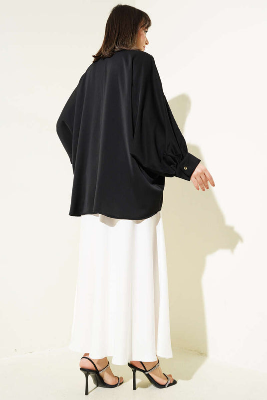 Chemise oversize noire avec collier à manches chauve-souris