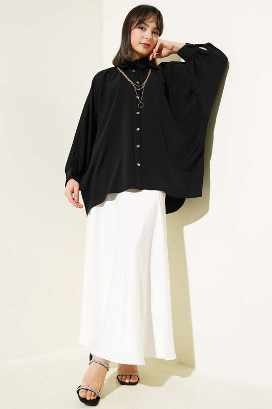 Chemise oversize noire avec collier à manches chauve-souris