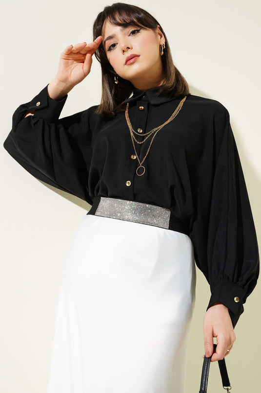 Chemise oversize noire avec collier à manches chauve-souris