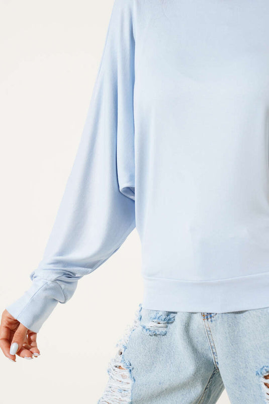 Blusa ampia con maniche a pipistrello blu