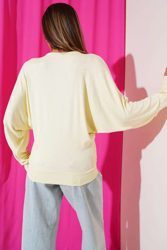 Chemisier jaune ample à manches chauve-souris