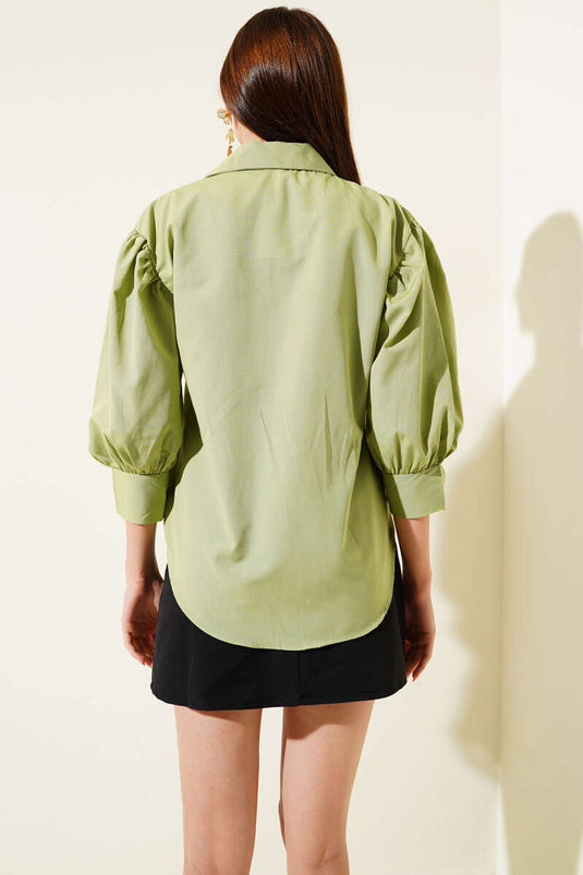 Chemise verte à manches demi-ballon
