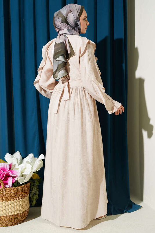 Robe beige à volants avec ceinture et demi-boutons
