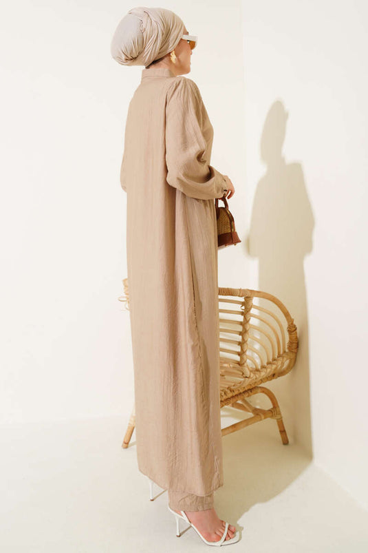 Abito lungo due pezzi con bottoni a metà, color latte