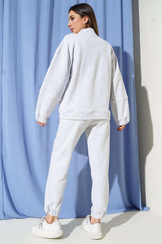 طقم مزدوج بخيط ثلاثي مع حافة وقفل نصف سحاب، رمادي ممزوج