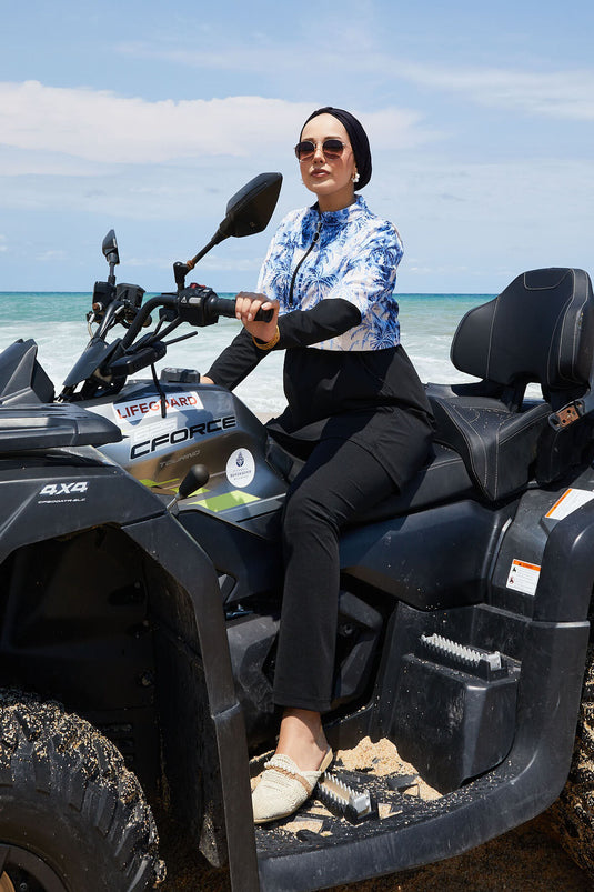 Maillot de bain modeste à demi-fermeture éclair et motif palmier indigo