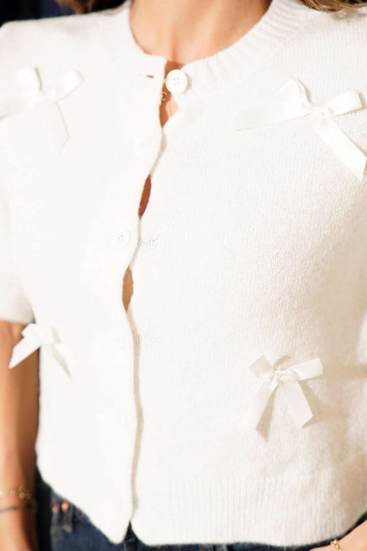 كارديجان محبوك بأكمام قصيرة مزين بفيونكة، لون بيج فاتح