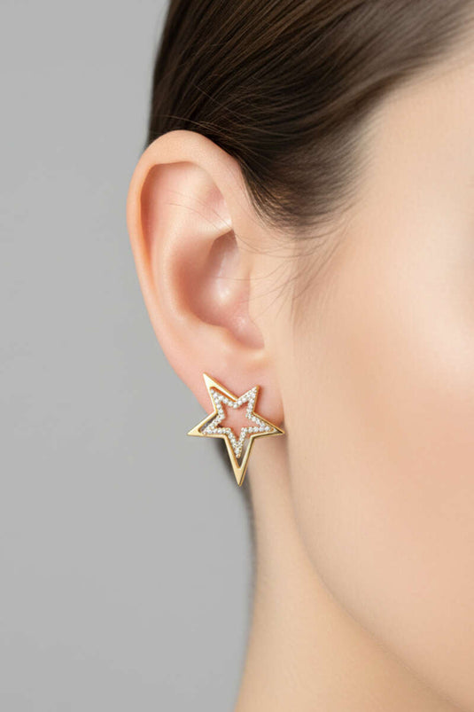 Boucles d'oreilles en or ornées de pierres avec motif étoile
