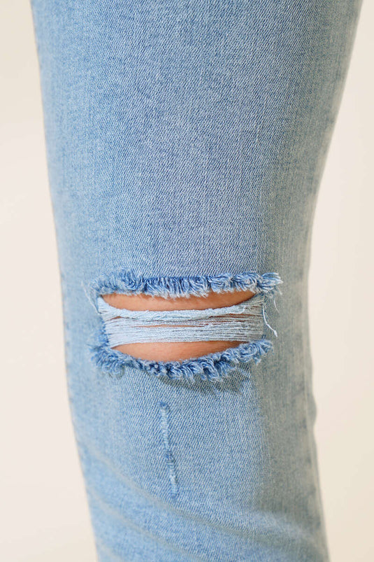 بنطلون دنيم ليزر بأرجل عالية وخصر نحيف باللون الأزرق الفاتح