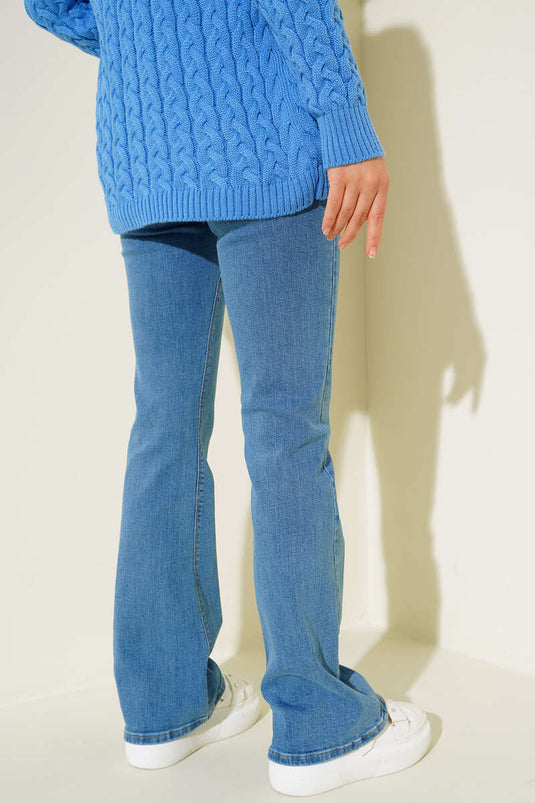 Pantalon bleu à taille haute et pattes d'éléphant