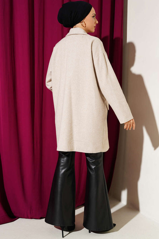 Manteau en cachemire beige à rayures en zigzag