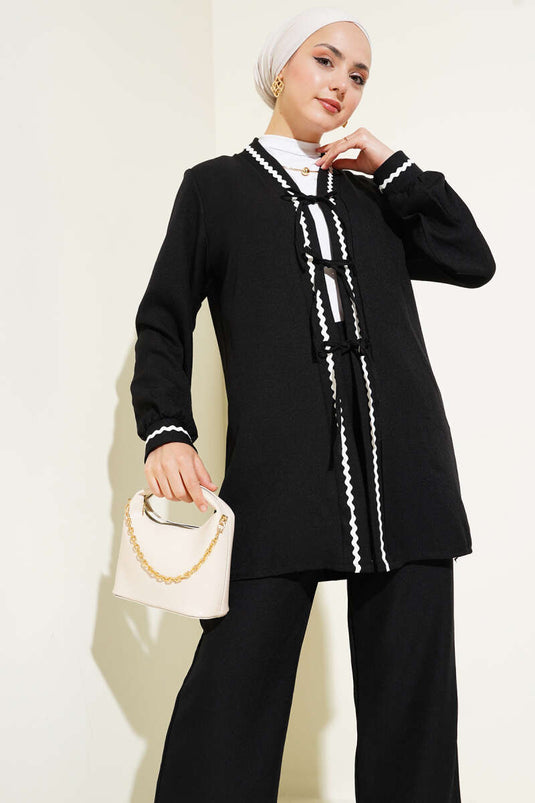 Ensemble deux pièces à lacets et détails en zigzag noir