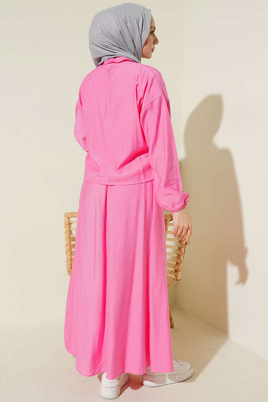 Ensemble deux pièces avec jupe à rabat à poche clouée rose