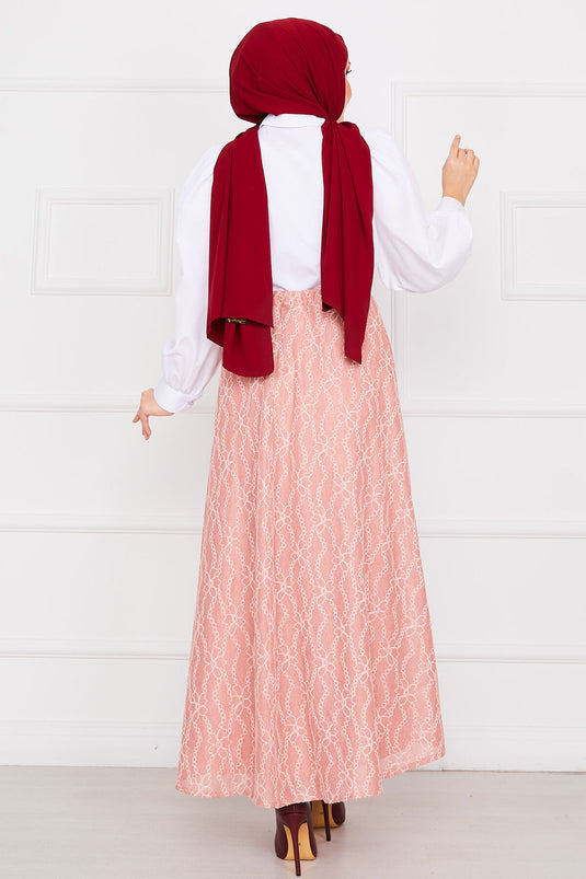 Jupe en dentelle à motif chaîne rose poudré