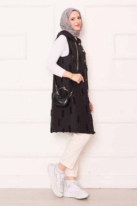 Gilet matelassé boutonné avec détails en chaîne noir