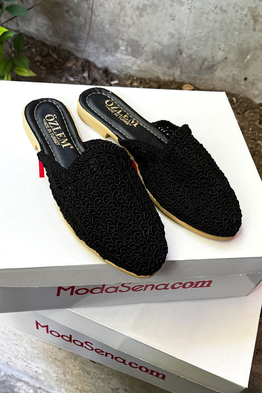 Chaussons à motifs en maille chaîne noire