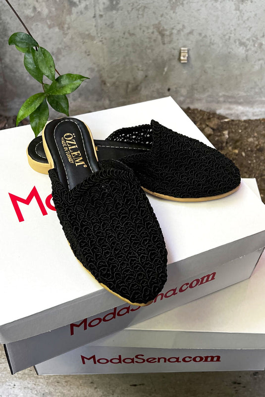 Chaussons à motifs en maille chaîne noire