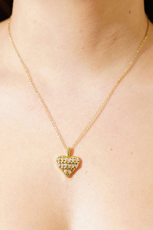 Collar de corazón con piedra de circón dorado