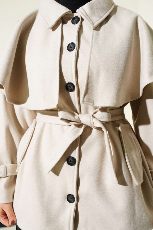 Manteau court en cachemire avec cape à épaulettes, beige.
