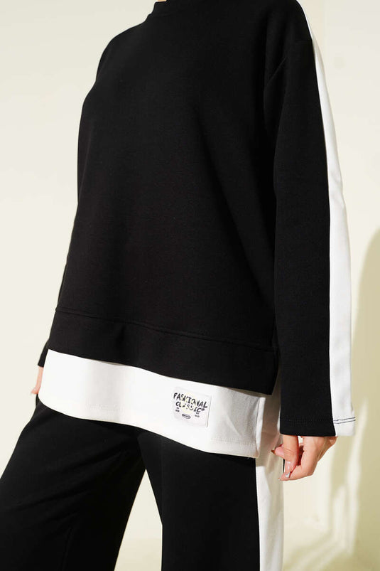 بدلة لويشا المزينة بقطعتين مع تفاصيل الشعار، باللون الأسود