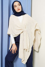 Poncho en tricot à coupe asymétrique couleur pierre