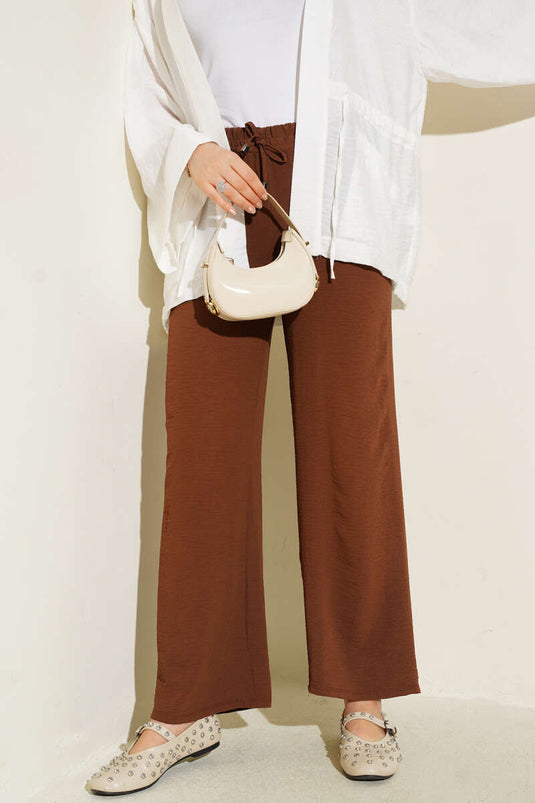 Pantaloni Ayrobin con elastico in vita color castagna