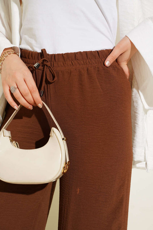 Pantaloni Ayrobin con elastico in vita color castagna