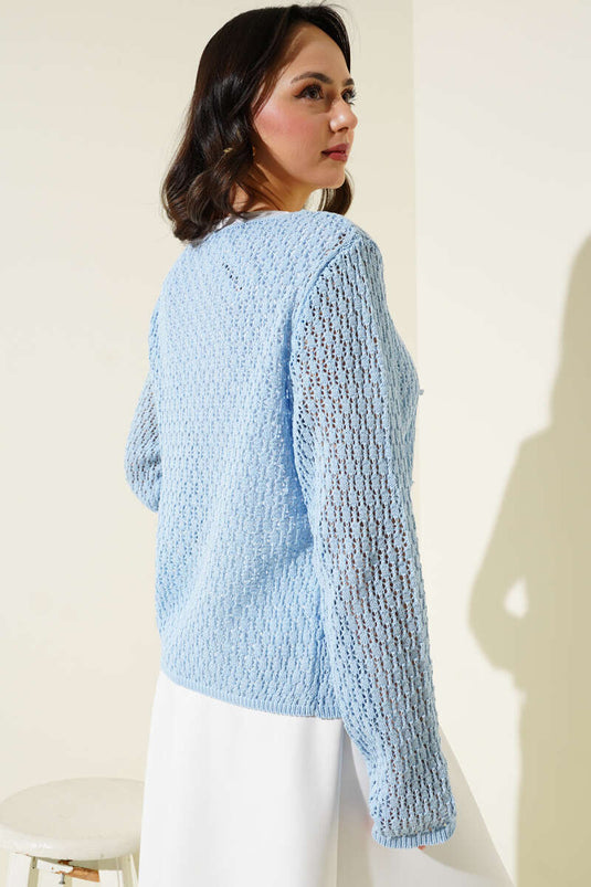 Cardigan court en maille ajourée à lacets bleu