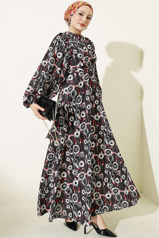Schwarzes Modest Kleid Mit Bindeband Und Rundem Muster