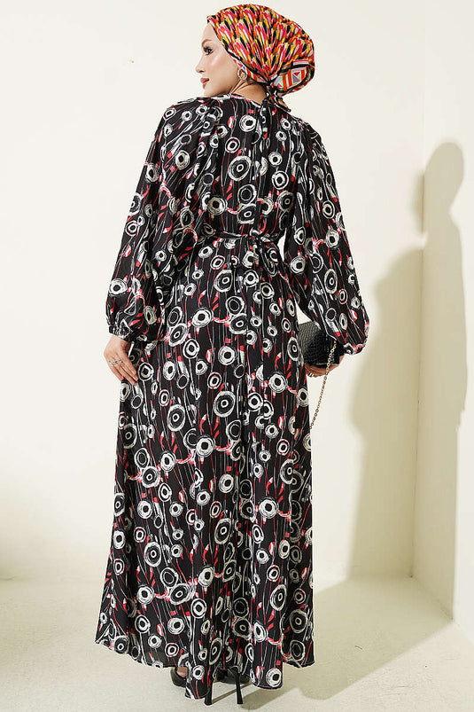 Schwarzes Modest Kleid Mit Bindeband Und Rundem Muster
