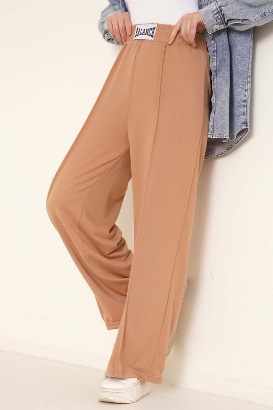 Pantalones anchos con bordado Balance Latte