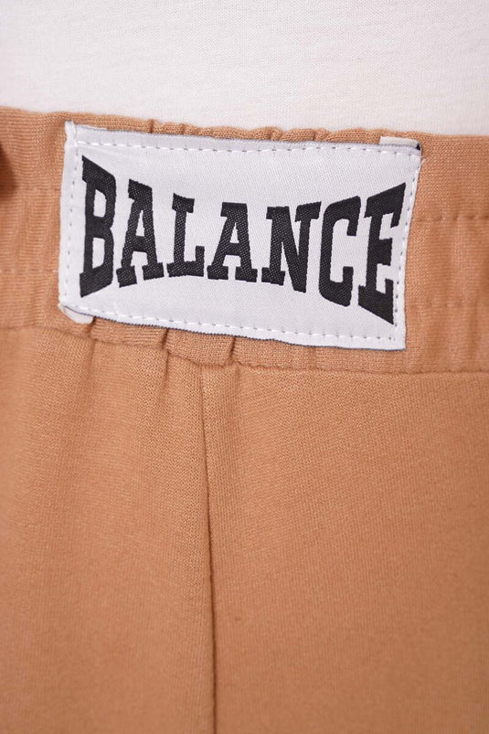 Balance-Hose mit weitem Bein und Stickerei in Latte