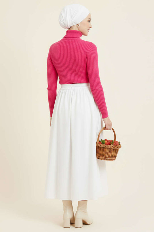 سترة وردية محبوكة مضلعة ذات رقبة مدورة