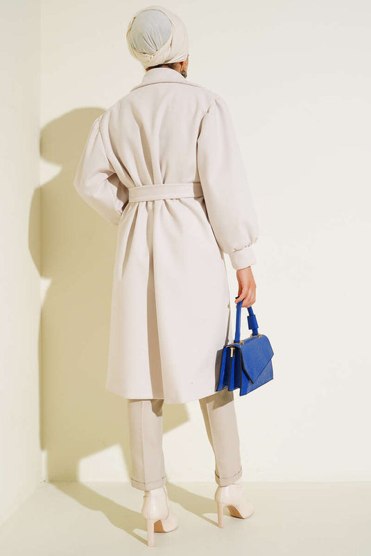 Manteau en cachemire écru à poignets ballon