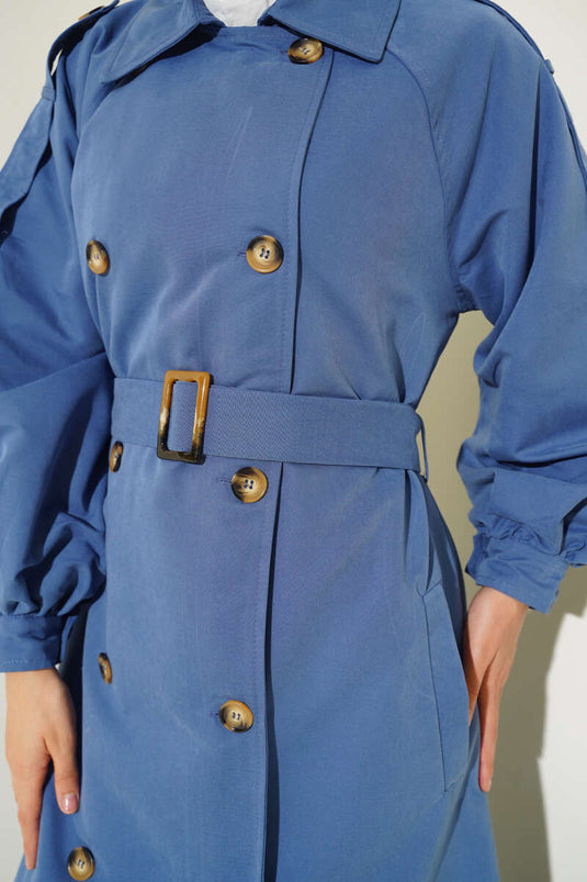 Lange trenchcoat met ballonmouwen en riem indigo