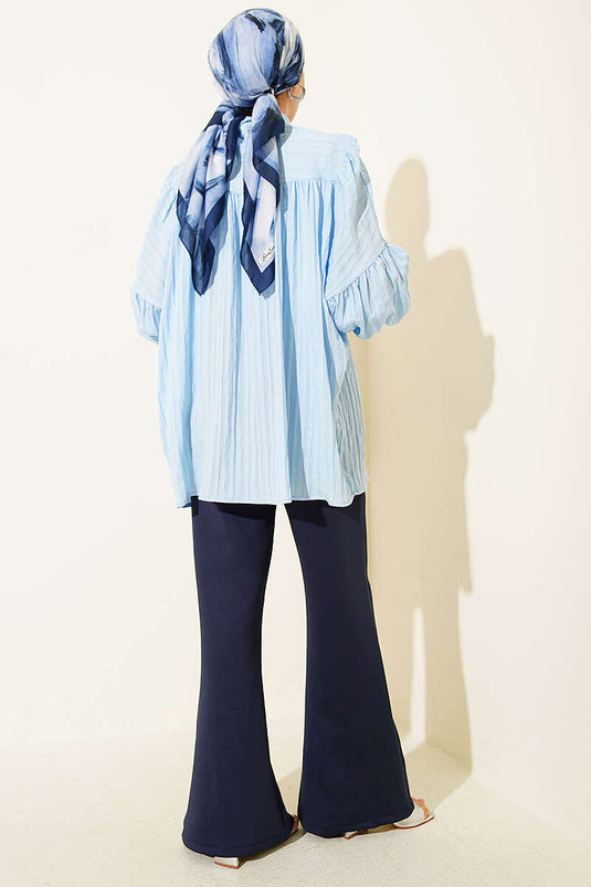 Chemise à manches ballon avec poignets bleu