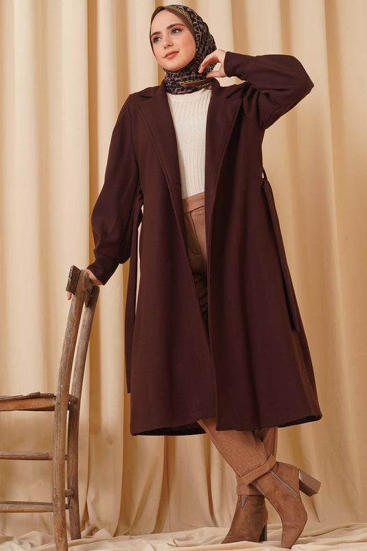 Cappotto con timbro marrone modello lungo con maniche a palloncino