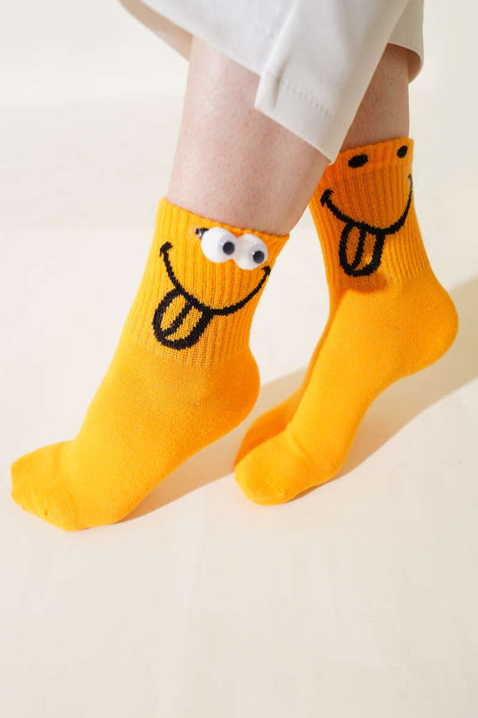 Chaussettes fantaisie pour femme, couleur moutarde, motif orbite.