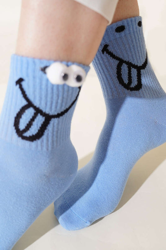 Verspielte Damen-Socken mit Augenhöhlenmotiv, blau