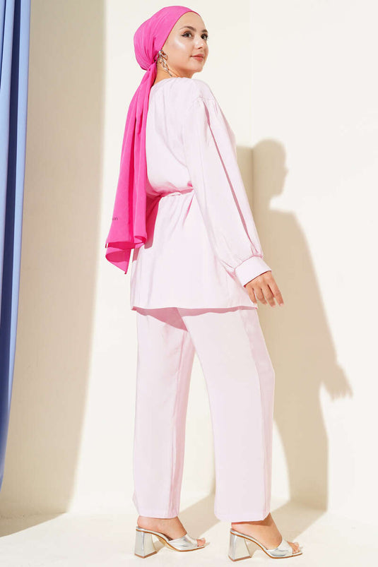 Ensemble deux pièces rose avec ceinture et col en corde pour bébé