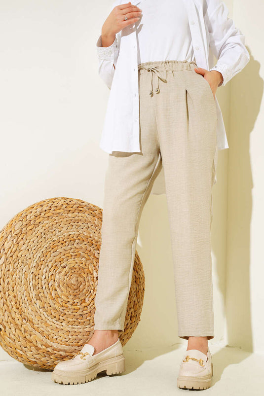 Pantalon Carotte En Dentelle Taille Beige