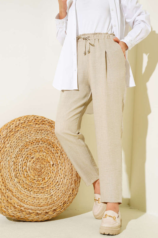 Pantalon Carotte En Dentelle Taille Beige