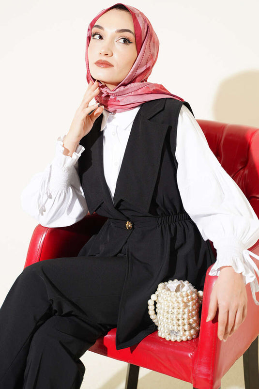 طقمان أسود مع صديري بتجاعيد