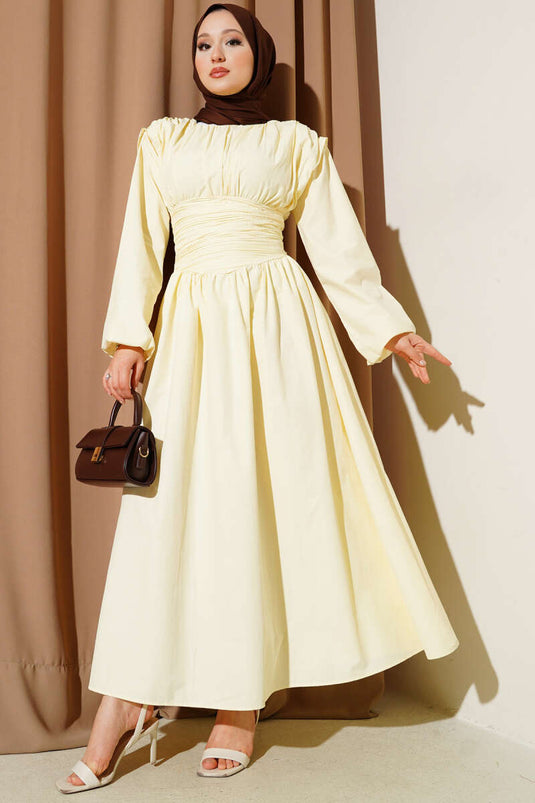 Robe évasée jaune à la taille marquée Gipeli