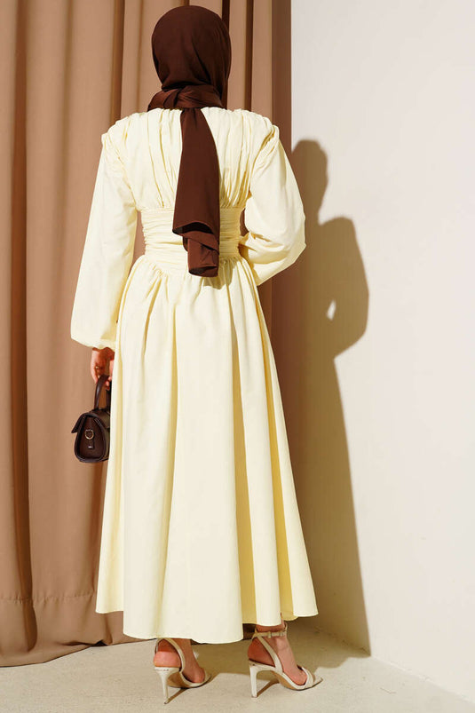 Robe évasée jaune à la taille marquée Gipeli